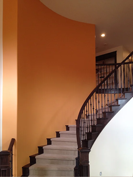 repainted stairs with statement orange